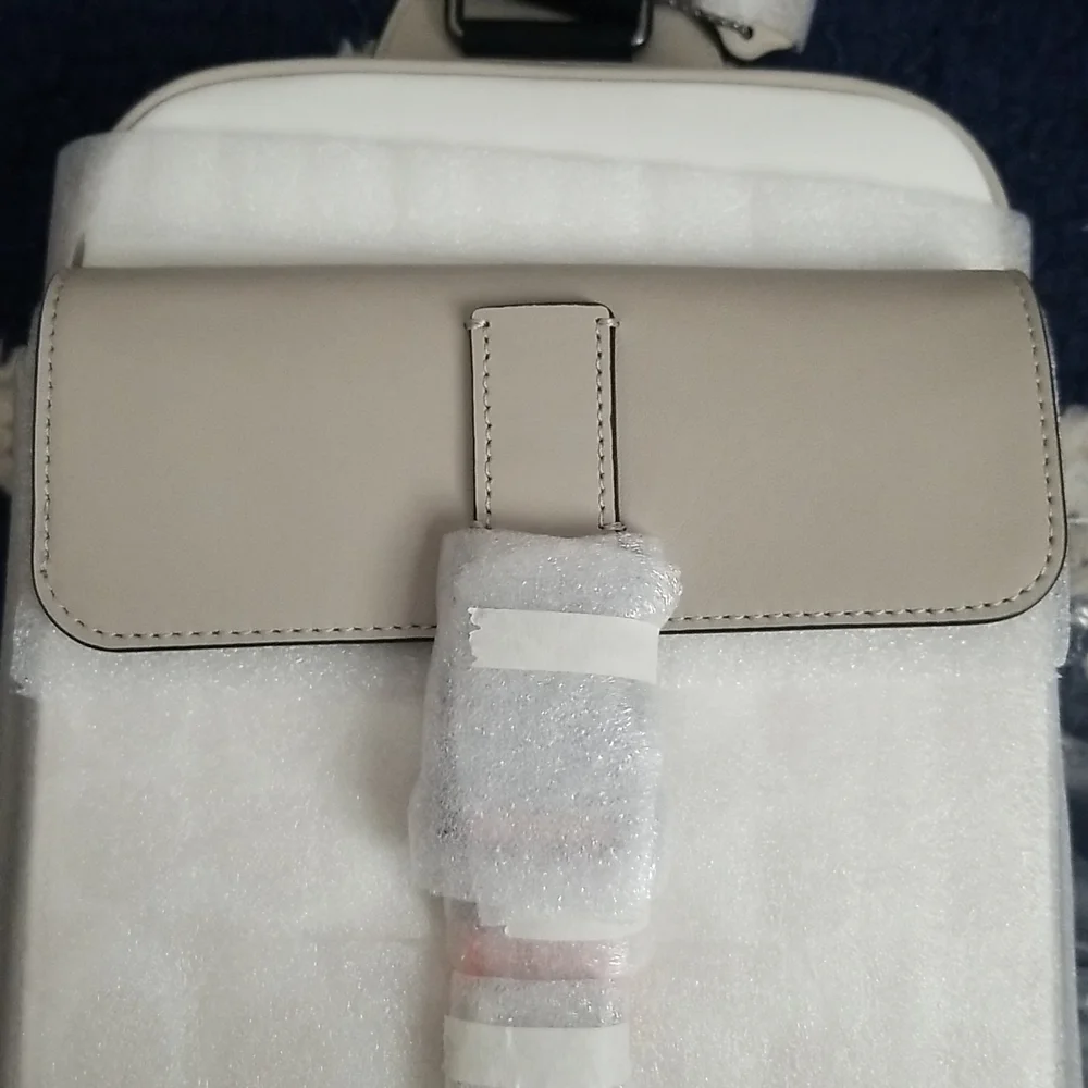 Coach - Picture 2 of 4
